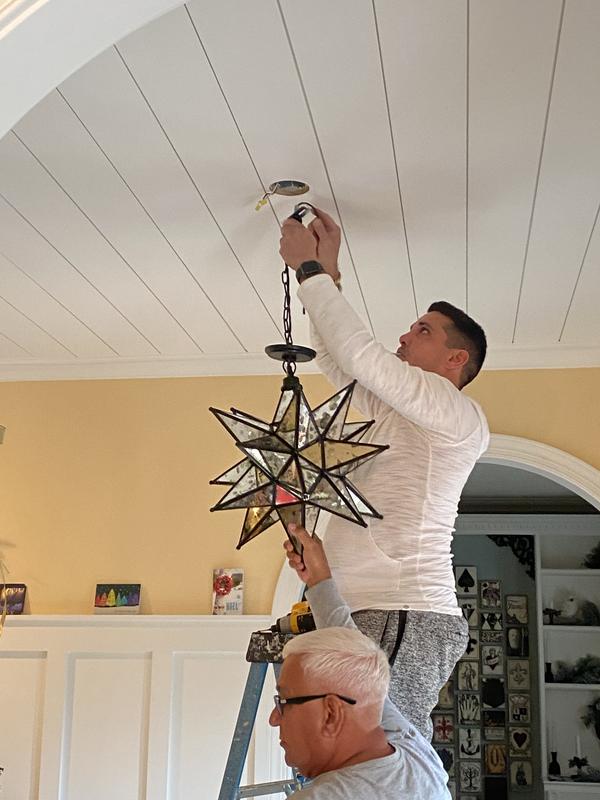 Hanging A Moravian Star Light In The Foyer