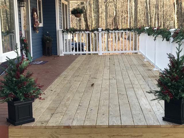 The trees make even an unfinished deck look good!!