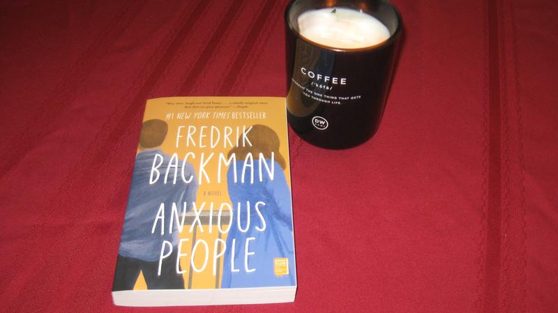 my book and coffee scent candle