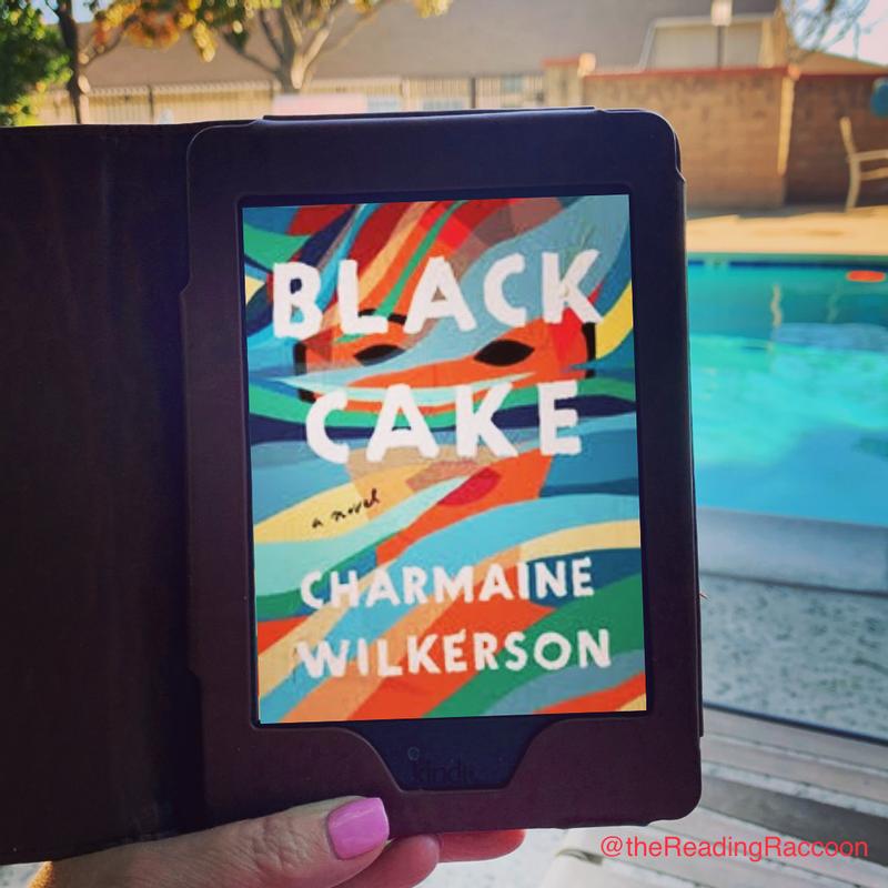 The Reading Raccoon Instagram photo of a poolside read of Black Cake by Charmaine Wilkerson