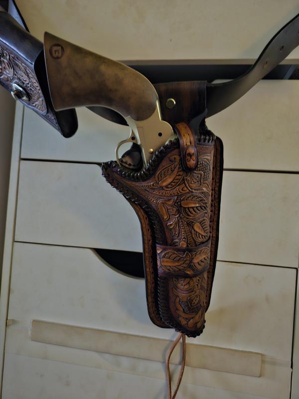I'm a leather craftsman and made the holster.