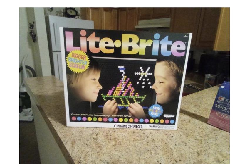 # 1 Lite Brite Pegs 5.2 Oz. Approximately 250+ Pieces, 7/8 Long Mixed  Colors.