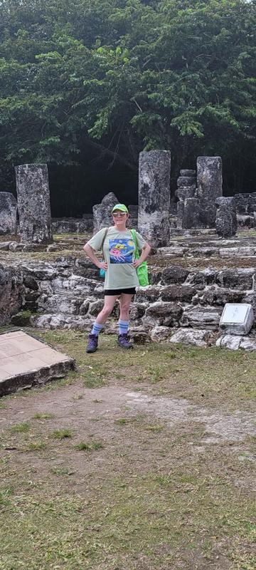 Photo of be on my hike wearing the boots with tall sock on.