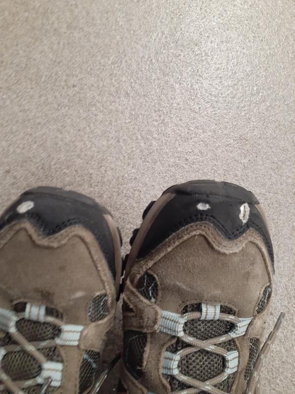 Both shoes full of holes