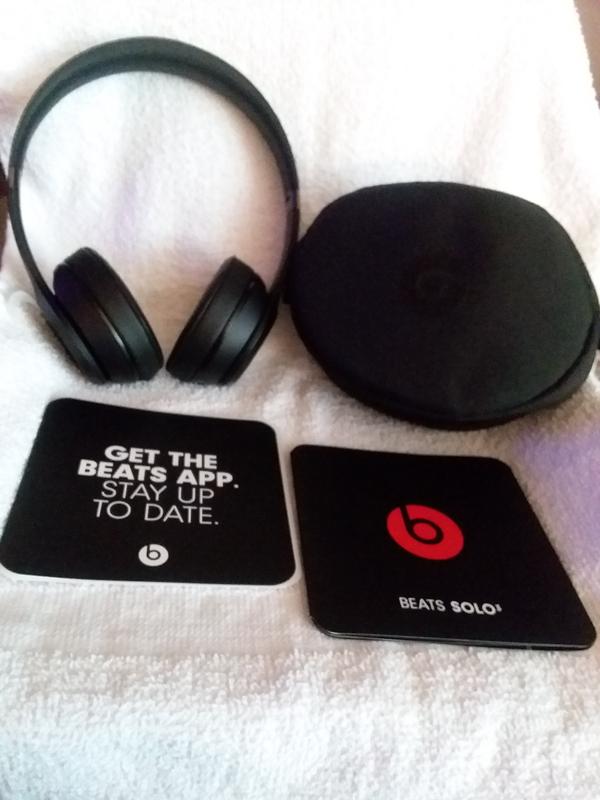 Headphones, carrying case and instructions