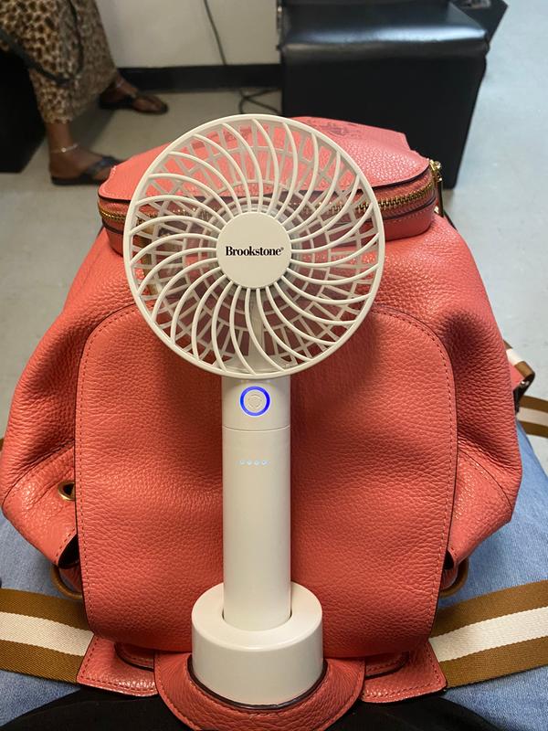 Brookstone® 4Inch Rechargeable Mini Fan with Power Bank in White Bed