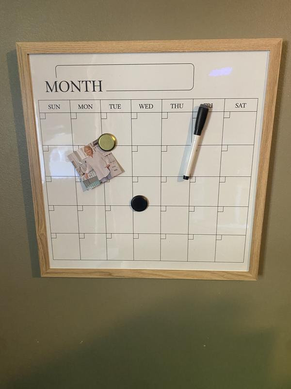 The set includes 2 magnets and a magnetic dry erase marker.