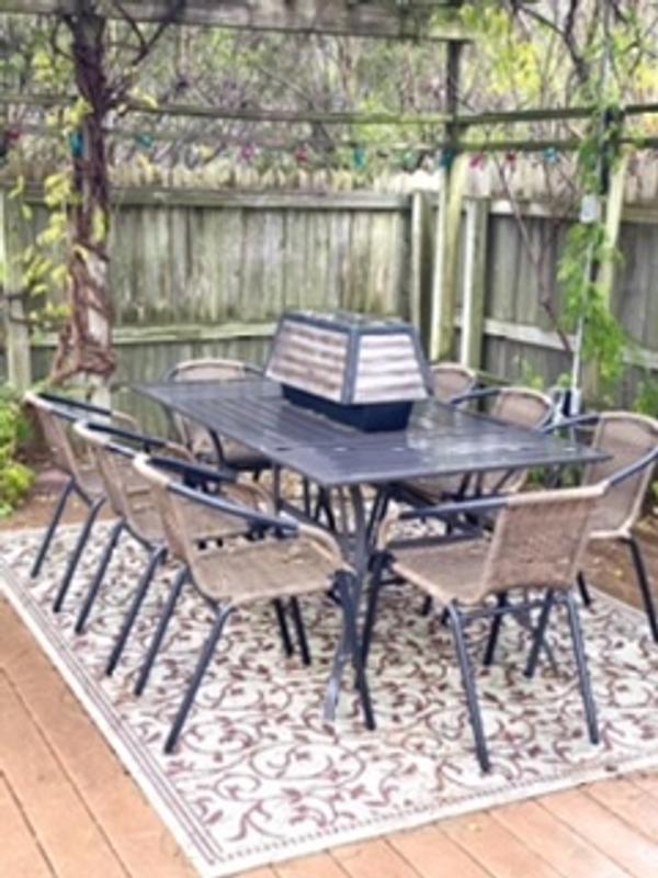 Indoor or Outdoor Restaurant Chair with Black Frame Finish  and Brown Rattan 