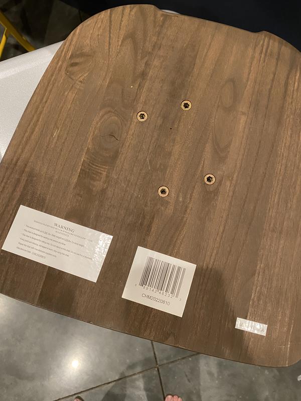 Bottom of seat with 4 holes… no screws came for the seat, nor any way of attaching it.