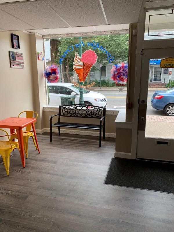 The green and yellow are in different locations (mixed colors on chairs and tables)