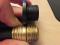 new garden hose thread & Frigidaire A/C drain fitting (black), click to load a larger version
