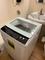 Move the washer into position. (It has wheels on the back), click to load a larger version