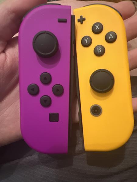 Nintendo Switch Joy Con Controller, Neon Purple/ Orange