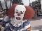 Tim Curry as Pennywise, click to load a larger version