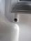 Freezer door - lower bracket (note screw), click to load a larger version