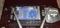 The back opened, exposing where hard drive should be., click to load a larger version