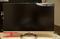 I want to know the height of the monitor from the bottom of the monitor to the table or desk you'd sit it on, click to load a larger version