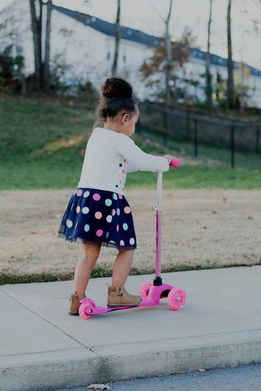 Riding my super cool new scooter!