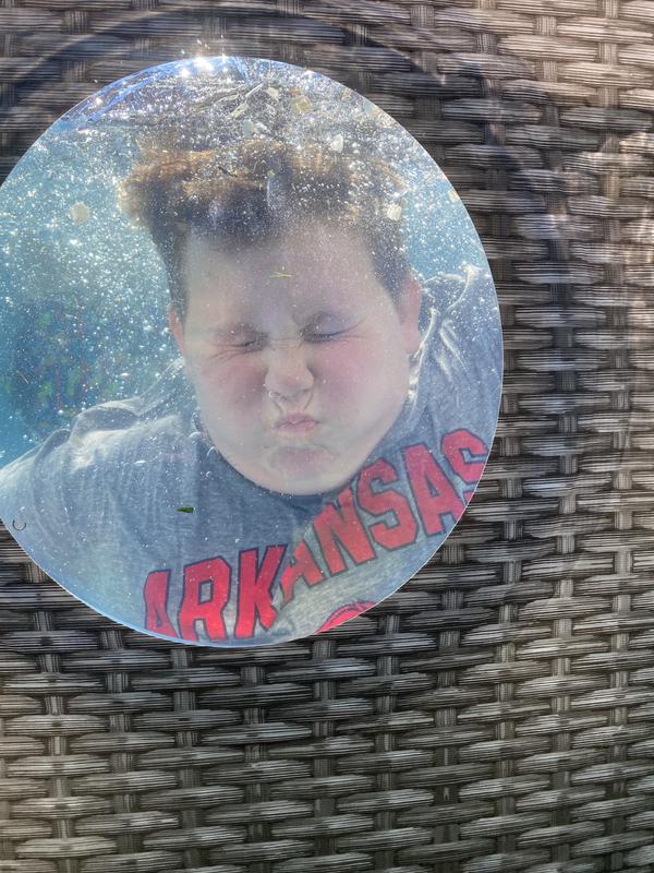 Built in porthole windows in the pool.