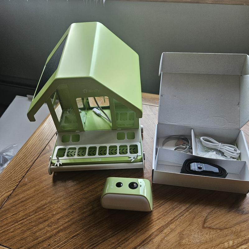 Customer photo for "Great feeder to add to any collection!"