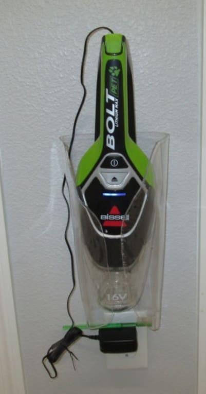 Bissel mounted on wall in plexiglas holder