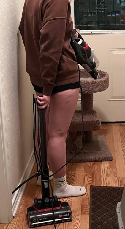 Using the handheld vacuum, having to lug around the entire vacuum.