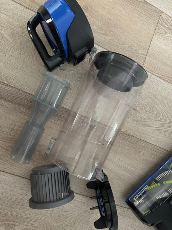 You'd need to put your hand in the dust bin to remove filter