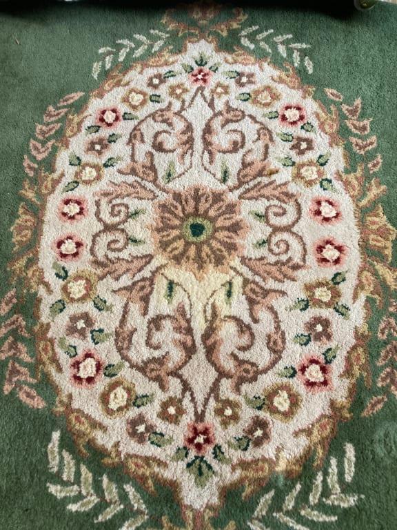 The stain is barely visible after using the wash mode.