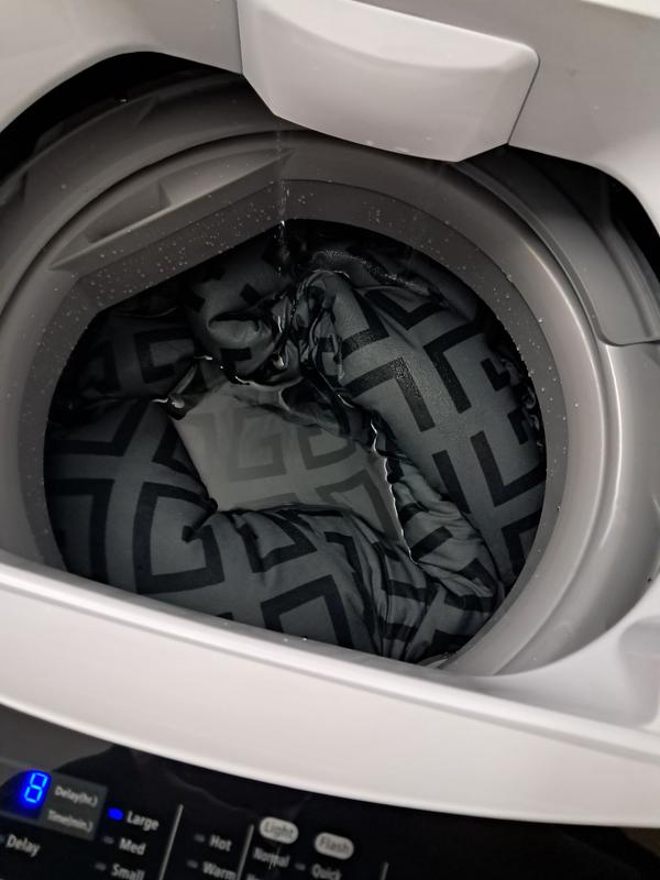 I love how it fits in my closet for storage and in my little bathroom when im using it. I put my huge blanket in here.. I love how it came with the cap for the hot water since I will use cold water.