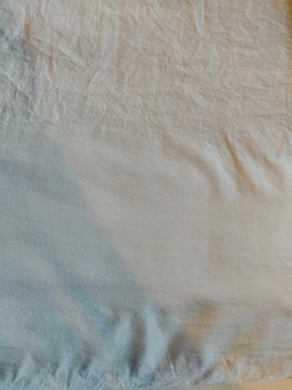 Top is before and bottom is after it has been ironed