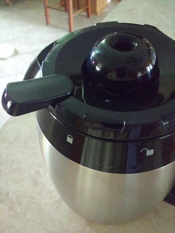 Dispensing tab and locked and unlocked indicators