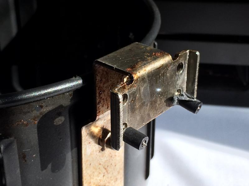 Broken screw sockets still attached to screw on the basket