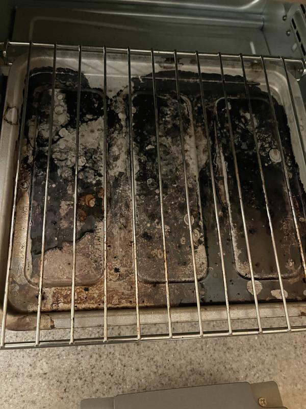 This tray was never used; it was inside the toaster when I was air frying nuggets to catch crumbs.  It was in the toaster on 2 occasions and it turn black.