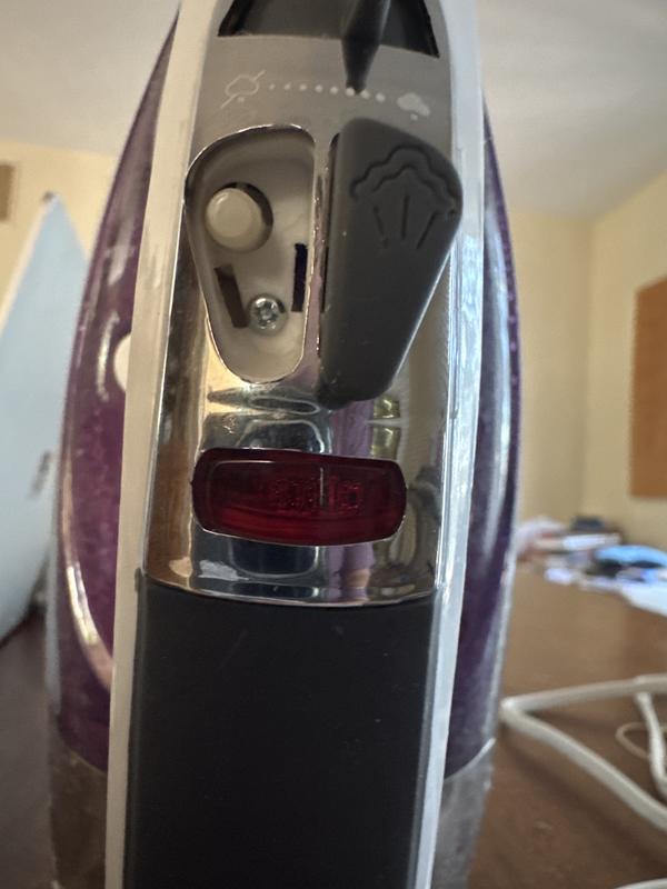 Spray button will not stay seated properly