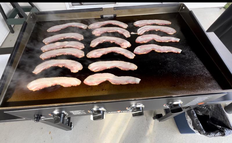 Wind Screen installed and a cooking Saturday morning bacon.