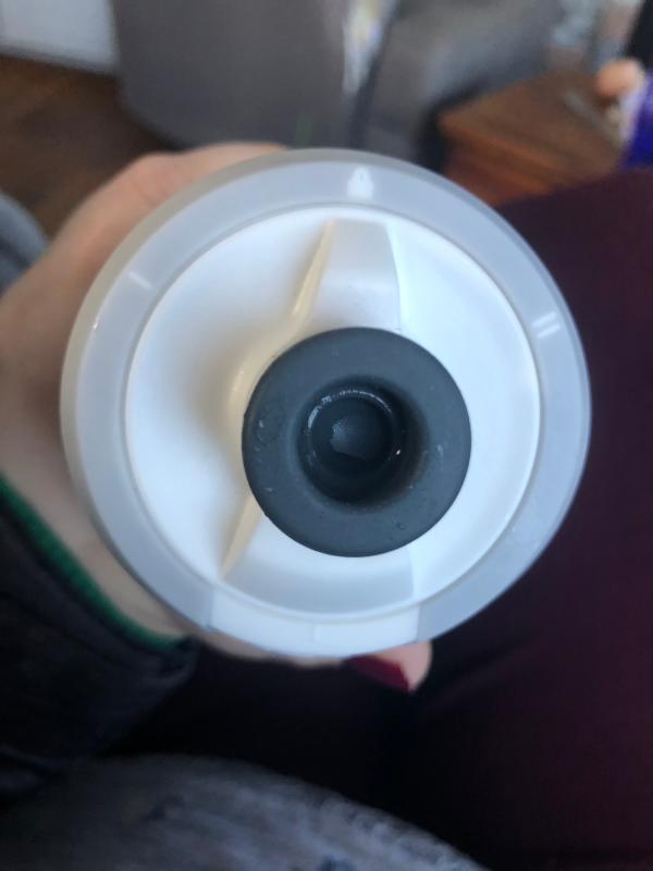 The top of the water bottle. Shows the three modes.