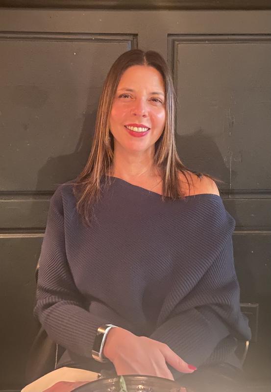 The sweater in dark teal