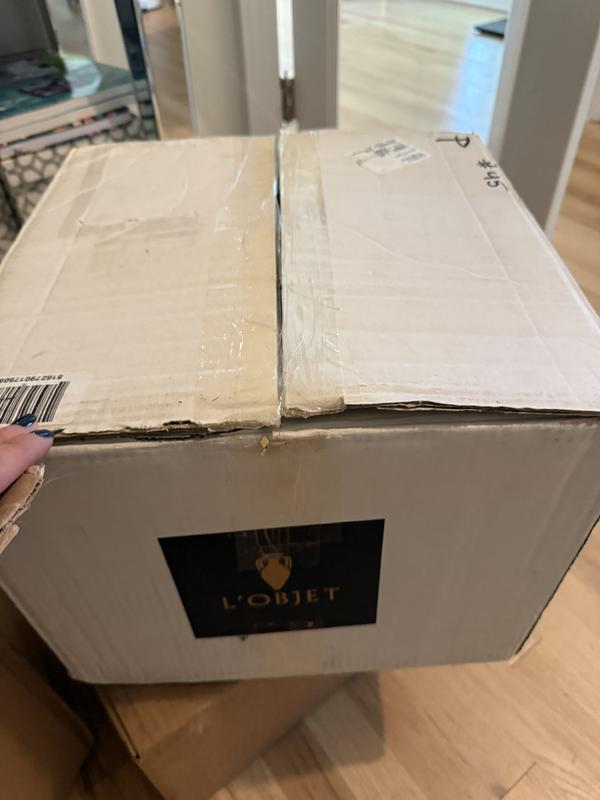 This old discolored is what the item was shipped in with no proper wrapping inside, see the second image.