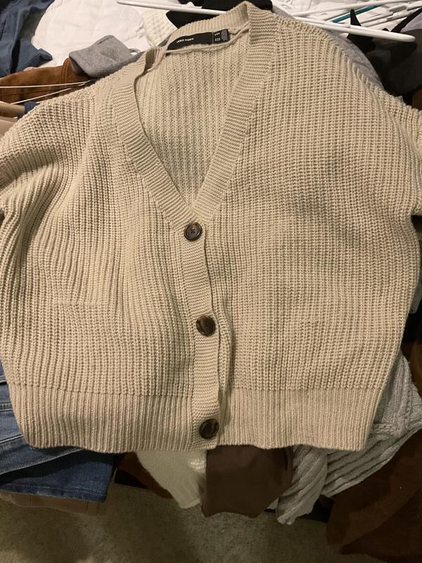 2 snags, one on either side of middle button.