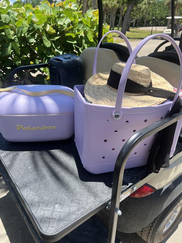 Me & my spacious Bogg Bag at the Beach House. I love that this bag is water resistant and so durable. I was able to carry all of my necessities to the beach in one trip. The quality is amazing.