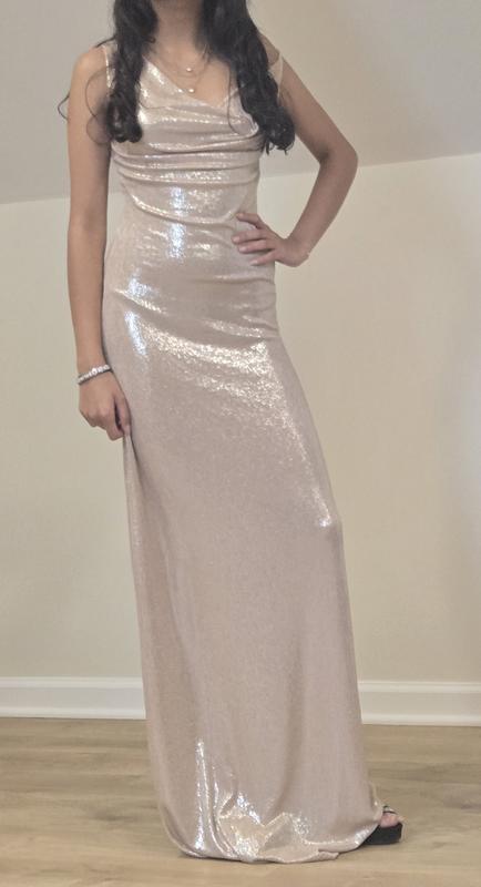 It's not the posture.. it's the dress!!