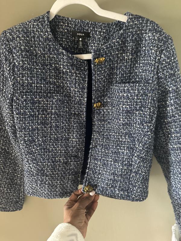 New without a button as it fell off. Never been worn, however button fell off.