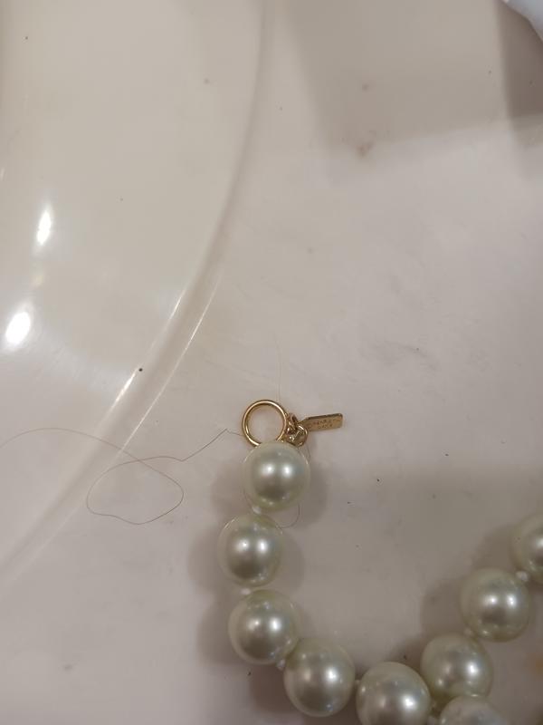 Really disappointed to receive a supposedly brand new necklace.  It looks like someone took off their neck and sent it to me.  Soo disapponted in Bloomingdale.   I could've bought this at a thrift store!!!!!!