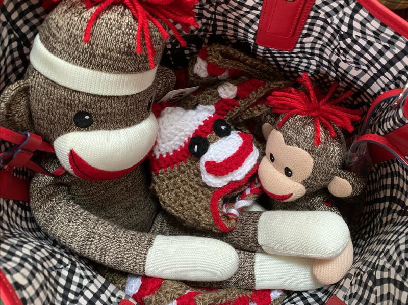 I filled this beautiful tote with cute sock monkey dolls and a blanket my best friend made for my grandson before giving it to my daughter.  She is currently serving our country and deserves the best. 
Proud Navy mom and first time grandma here.