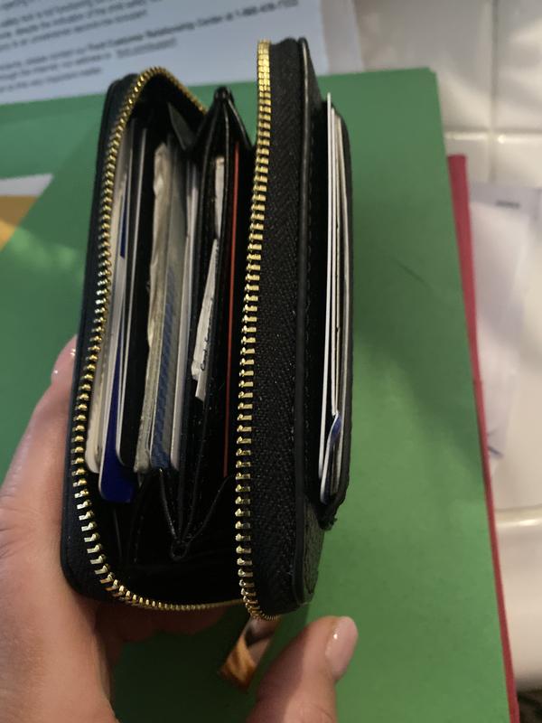 It hold all his cards, gold totem, and his ID’s in the front