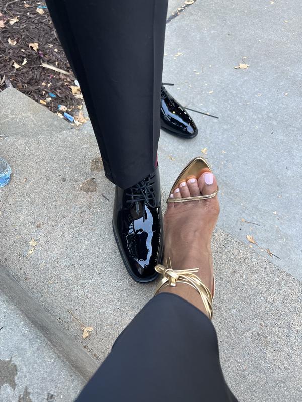 Sitting on a step because of the pain.