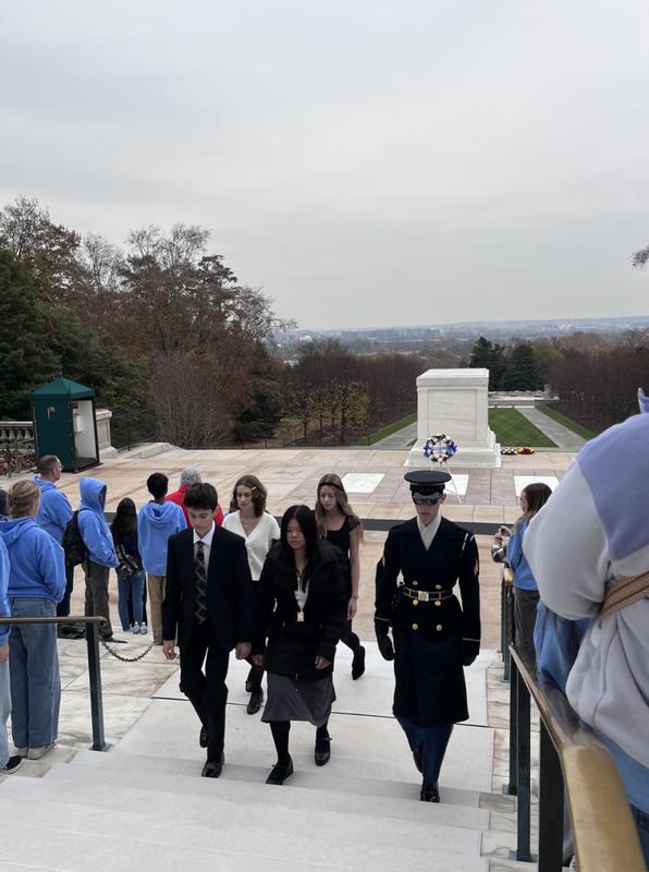 With a dress for wreath laying ceremony at Tob of Unknown Soldier