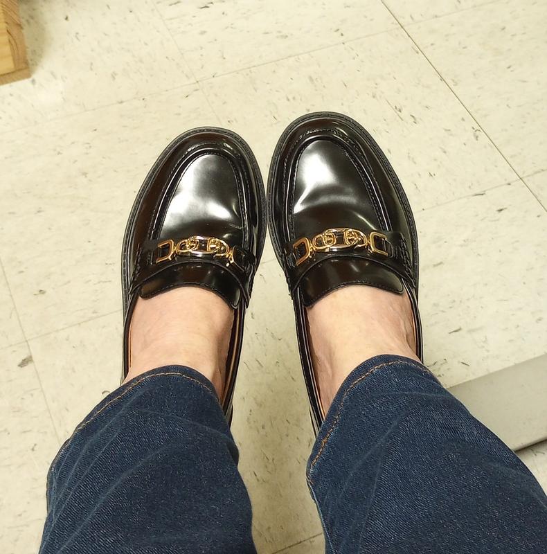 Slight shine and stylish hardware.