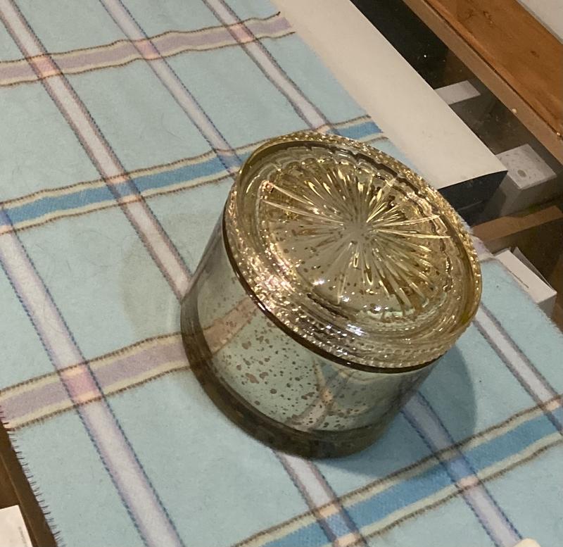 2 wick jar size, it’s sitting on a scarf.