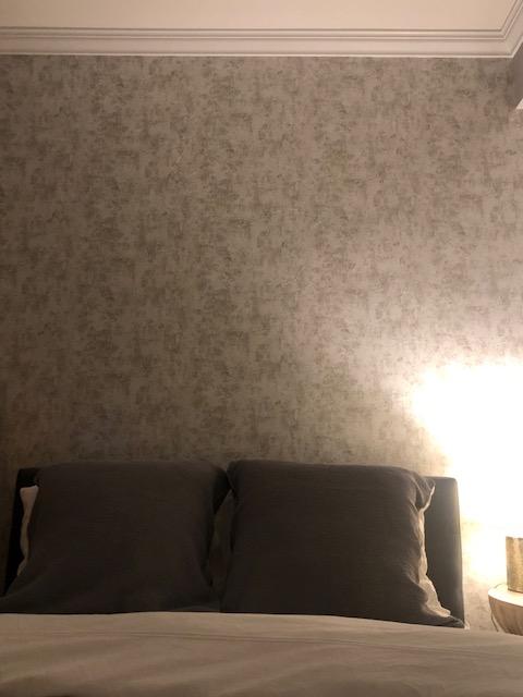 Accent wall at nighttime!  So pretty with mood lighting in our bedroom!